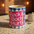Back & Body Hurts Ceramic Mug — Funny Plaid Pain Relief Coffee Cup (11oz)